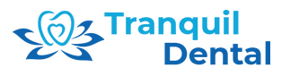 The image is a logo for  Tranquility Dental  with a blue and white color scheme, featuring a stylized flower to the left and the text  TRANQUILITY DENTAL  in uppercase letters.